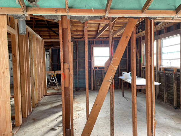 Construction showing converting a garage to a single family home.